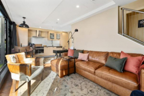Marvelous Downtown Apartment Moments from Main Beach with Heated Pool, Gym and Parking